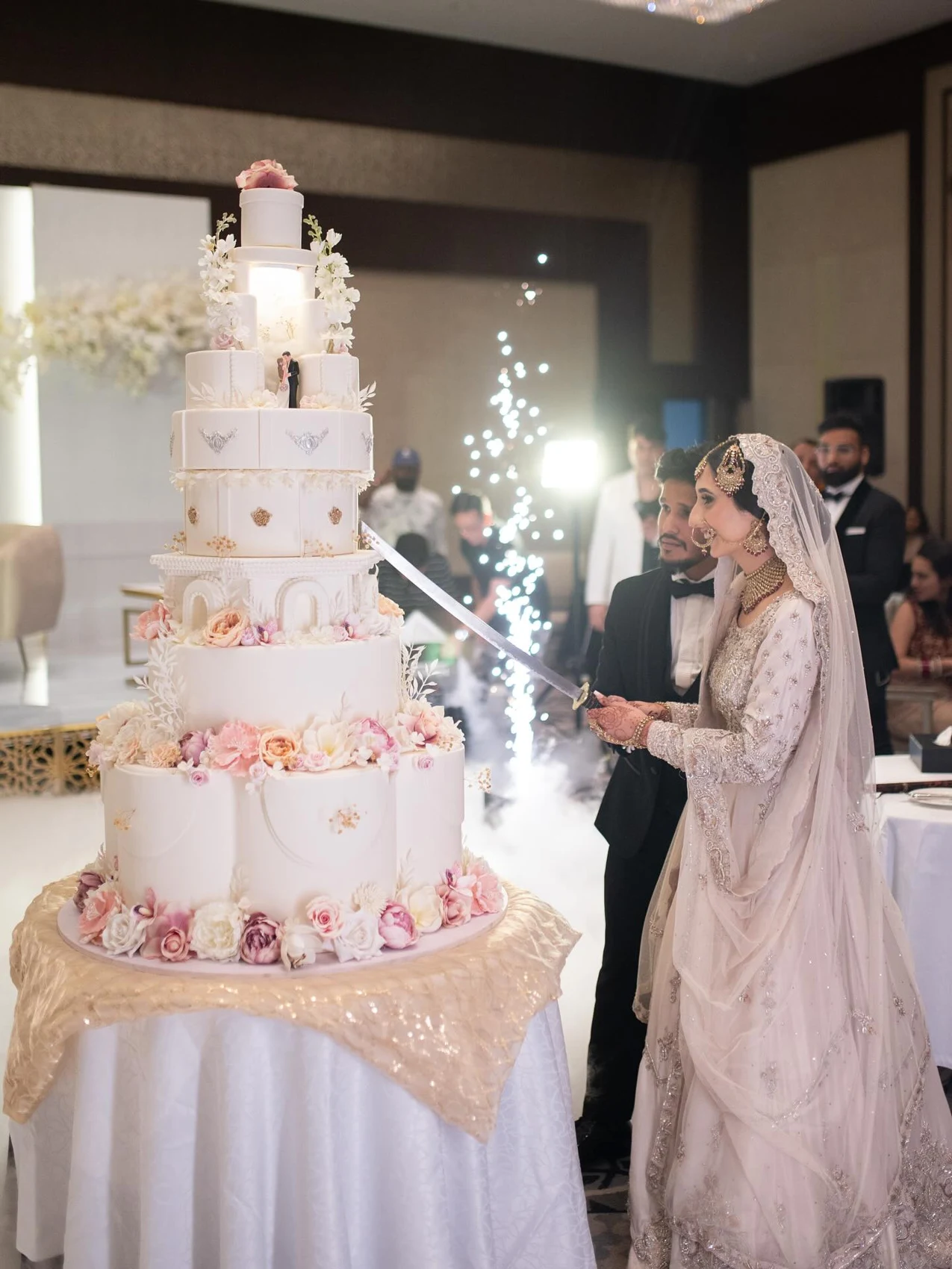 Zoya with the wedding cake she created for her own celebration
